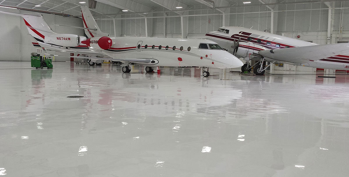 Epoxy vs. Polyurethane Coatings - Aerospace Flooring